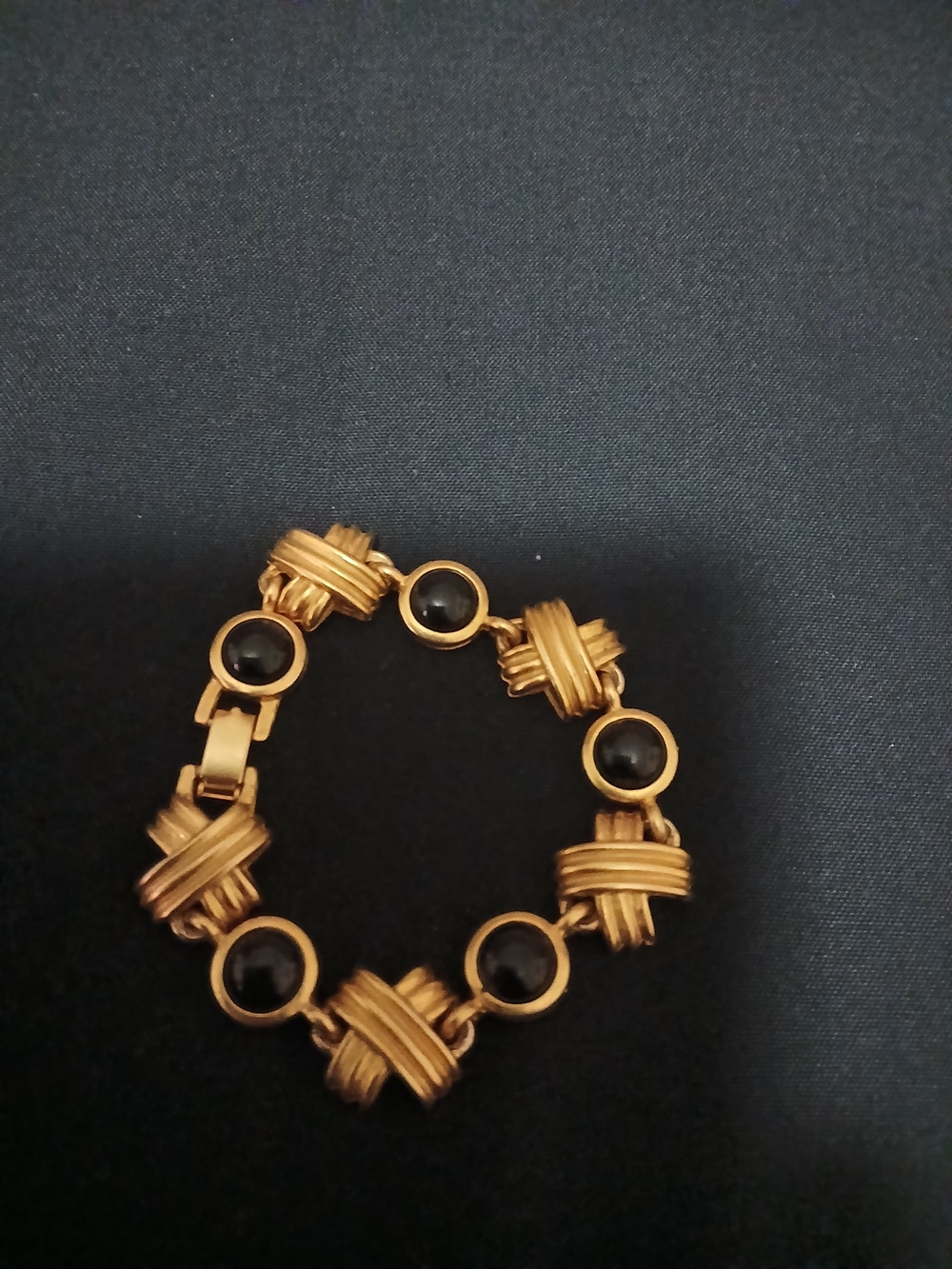 Gold-Tone Bracelet with Black Cabochon Accents